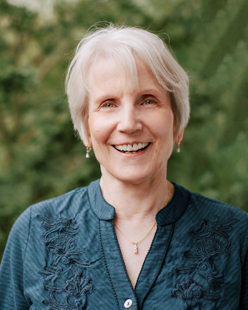 A photograph of Lois Svard smiling.